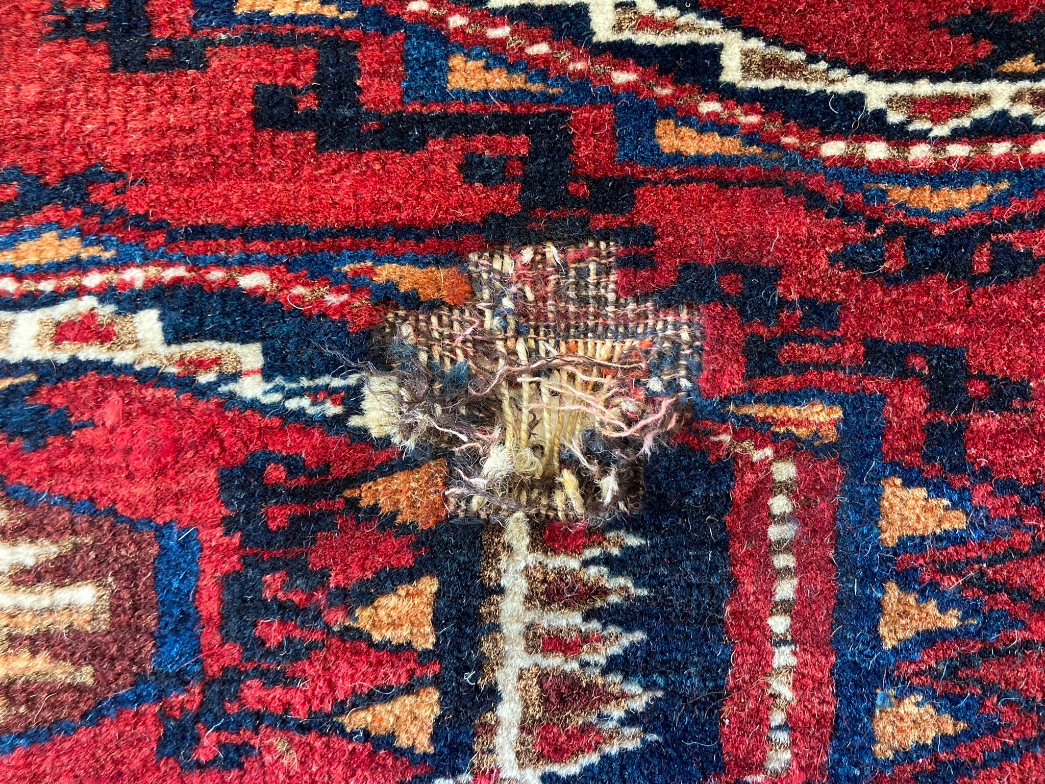 Teppichreparatur vorher